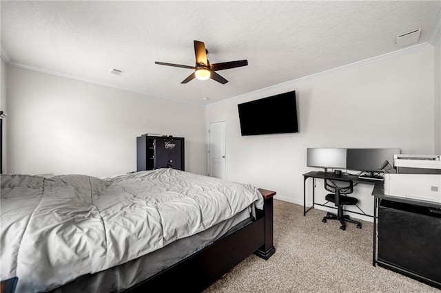 carpeted bedroom featuring a textured ceiling, ceiling fan, visible vents, and ornamental molding