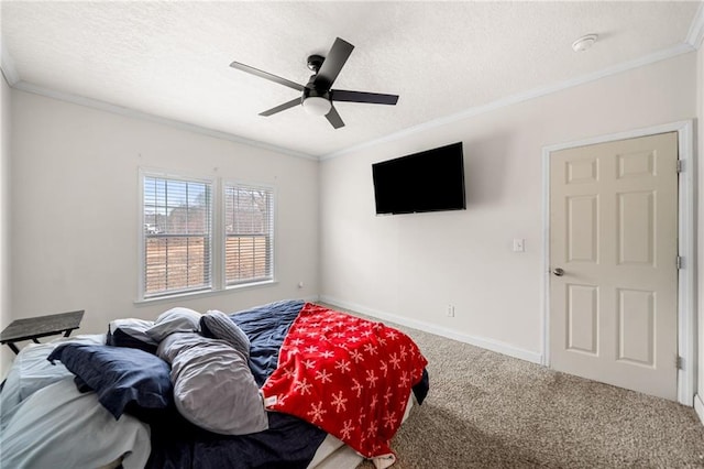 bedroom with a textured ceiling, carpet floors, and ornamental molding