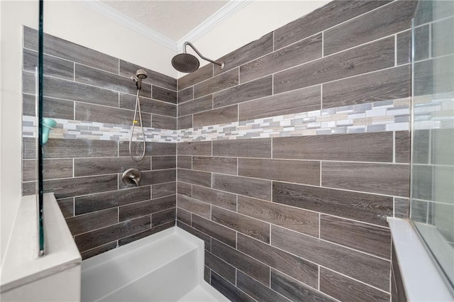 bathroom with tiled shower and ornamental molding