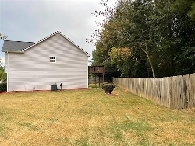 view of yard featuring central AC