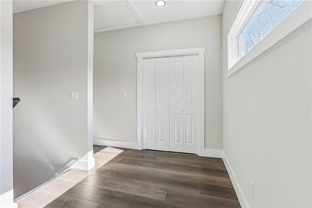 unfurnished bedroom featuring dark hardwood / wood-style flooring