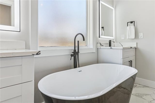 bathroom featuring vanity and a bathtub