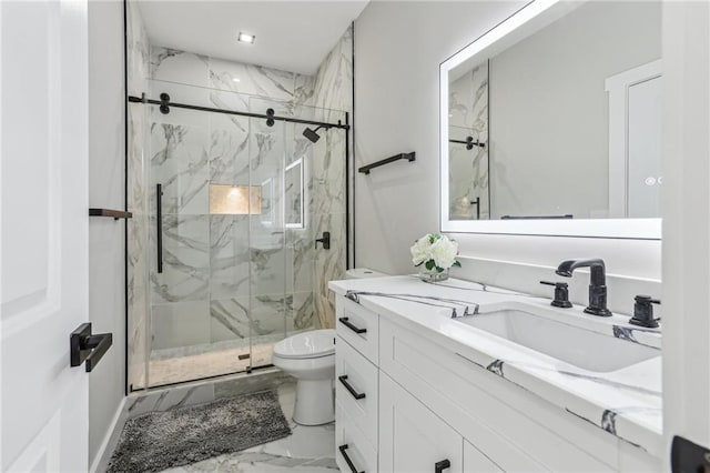 bathroom featuring toilet, vanity, and an enclosed shower