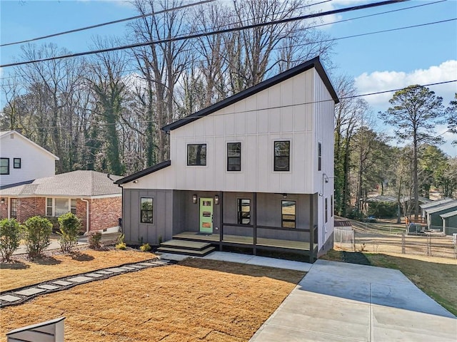 modern inspired farmhouse with a porch