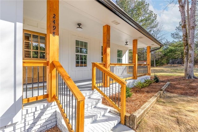 exterior space with covered porch and visible vents