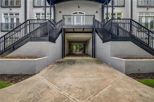 502 SW Pryor St SW Unit 325, Atlanta, GA 30312 - property entrance with stucco siding and concrete driveway