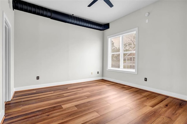 502 SW Pryor St SW Unit 325, Atlanta, GA 30312 - empty room with wood finished floors, ceiling fan, and baseboards