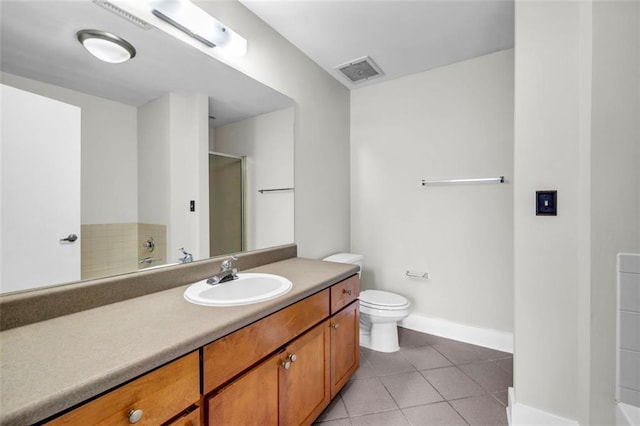 502 SW Pryor St SW Unit 325, Atlanta, GA 30312 - full bathroom featuring vanity, tile patterned flooring, toilet, a shower, and baseboards