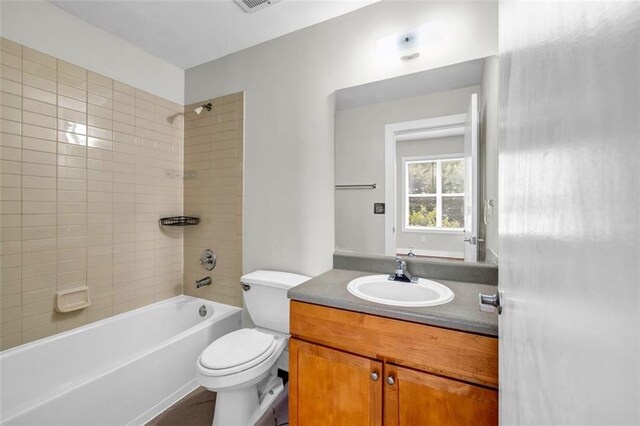 502 SW Pryor St SW Unit 325, Atlanta, GA 30312 - bathroom with vanity, toilet, and shower / washtub combination