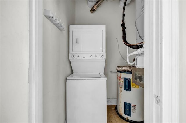 502 SW Pryor St SW Unit 325, Atlanta, GA 30312 - laundry room with electric water heater and stacked washer / drying machine
