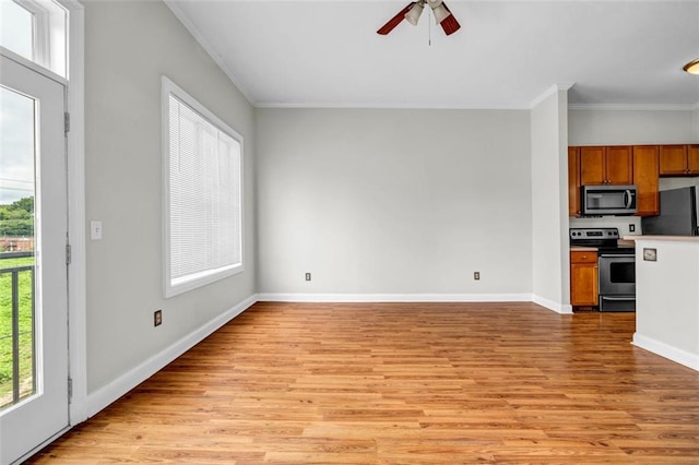 502 SW Pryor St SW Unit 325, Atlanta, GA 30312 - unfurnished living room with light wood-style flooring, ceiling fan, baseboards, and ornamental molding