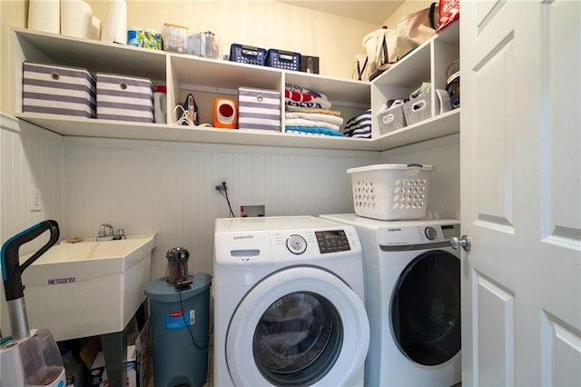 laundry room with sink and independent washer and dryer