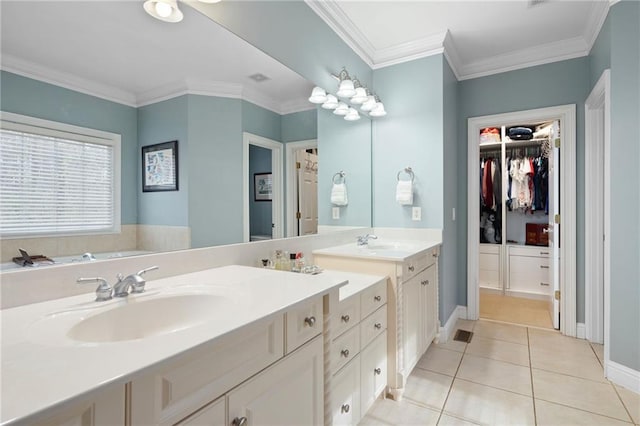 bathroom with tile patterned flooring, vanity, and ornamental molding