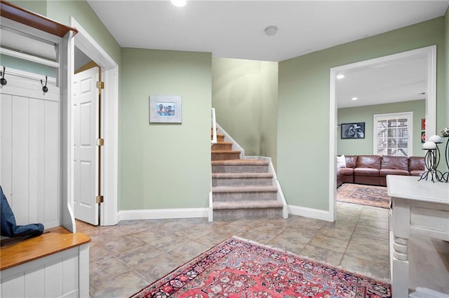 foyer entrance featuring light tile patterned floors