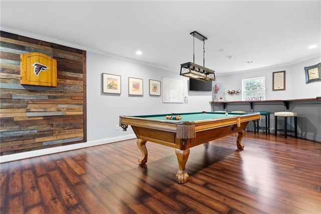 recreation room featuring ornamental molding, dark wood-type flooring, and pool table