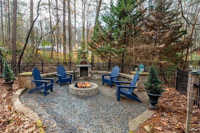 view of patio featuring an outdoor fire pit