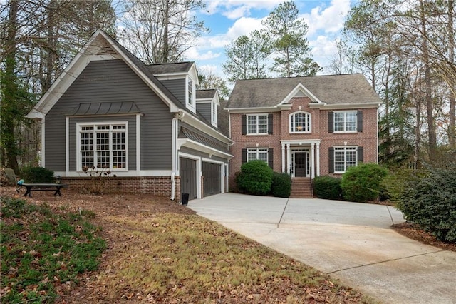 colonial house featuring a garage