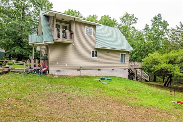 1182 Cedar Rd, Lincolnton, GA 30817 - back of property with crawl space, metal roof, a yard, and a balcony