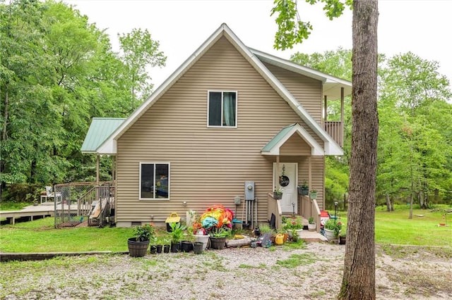 1182 Cedar Rd, Lincolnton, GA 30817 - view of front facade with crawl space, a front lawn, and a wooden deck