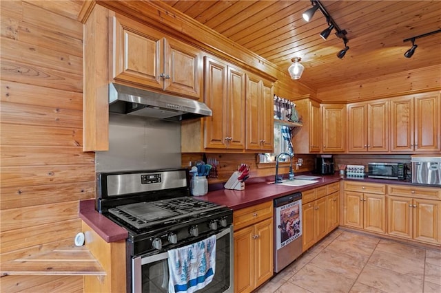 1182 Cedar Rd, Lincolnton, GA 30817 - kitchen featuring stainless steel appliances, rail lighting, under cabinet range hood, a sink, and dark countertops