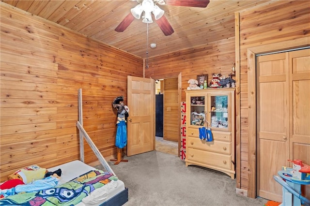 1182 Cedar Rd, Lincolnton, GA 30817 - carpeted bedroom with wood walls, a ceiling fan, and wooden ceiling