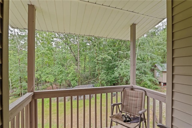 1182 Cedar Rd, Lincolnton, GA 30817 - wooden deck featuring a lawn and a view of trees