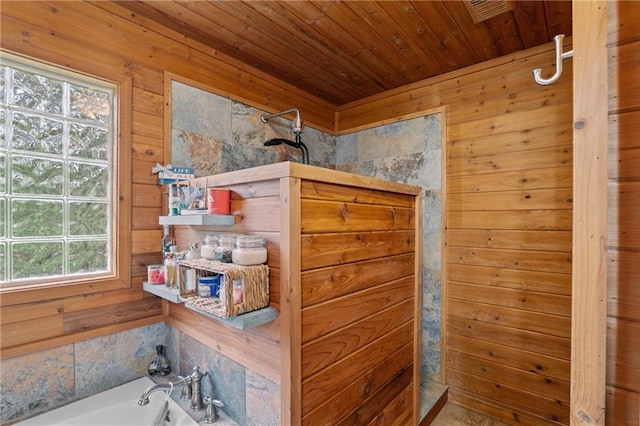 1182 Cedar Rd, Lincolnton, GA 30817 - bathroom view of wooden walls, a garden tub, and wood ceiling
