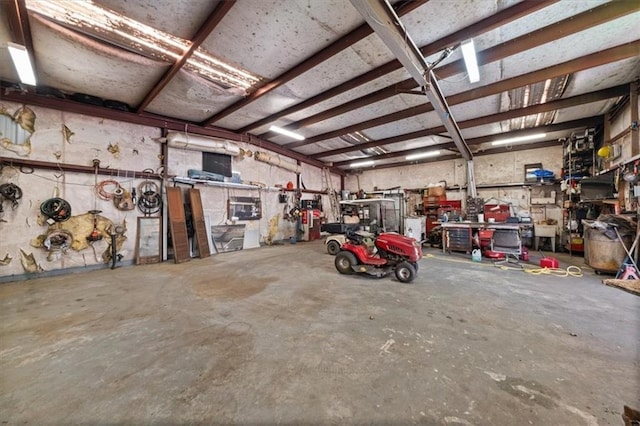 garage with a workshop area