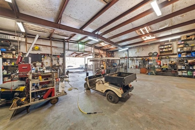 garage with a workshop area