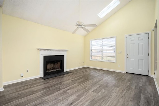 4157 Lake Mist Dr NW, Kennesaw, GA 30144 - unfurnished living room featuring a ceiling fan, a fireplace with flush hearth, high vaulted ceiling, baseboards, and dark wood-style floors