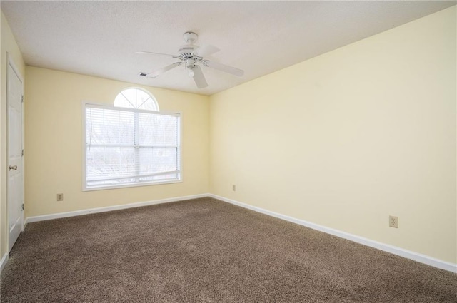 4157 Lake Mist Dr NW, Kennesaw, GA 30144 - spare room featuring a ceiling fan, baseboards, visible vents, and dark colored carpet