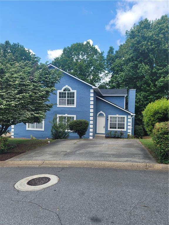 4157 Lake Mist Dr NW, Kennesaw, GA 30144 - view of front of home with a chimney
