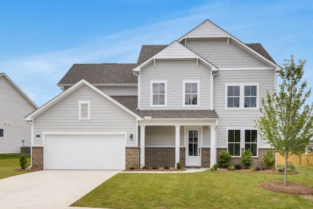 39 Pecan Ct, Hoschton, GA 30548 - craftsman house featuring concrete driveway, a front yard, roof with shingles, and a garage