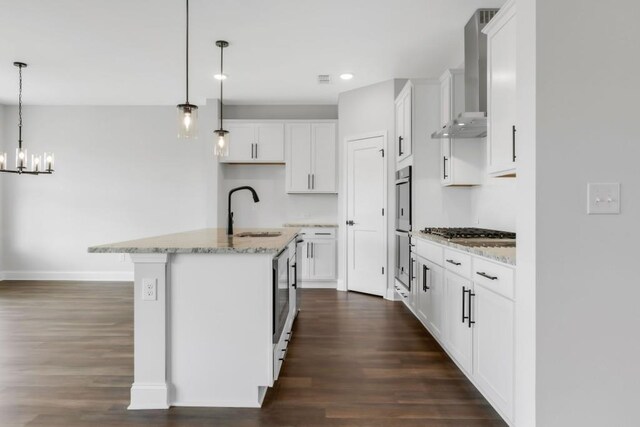 39 Pecan Ct, Hoschton, GA 30548 - bathroom featuring hardwood / wood-style flooring, vanity, and a shower with shower door