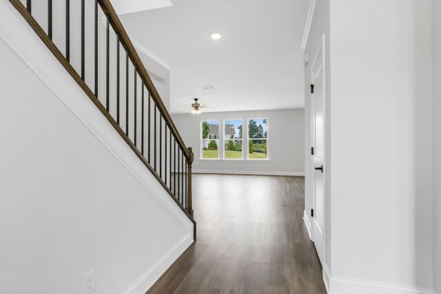 39 Pecan Ct, Hoschton, GA 30548 - hall featuring baseboards, stairway, wood finished floors, and recessed lighting