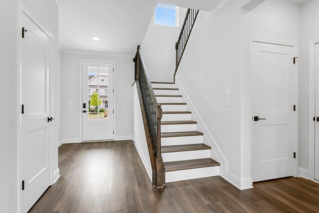 39 Pecan Ct, Hoschton, GA 30548 - entrance foyer featuring stairs, wood finished floors, plenty of natural light, crown molding, and recessed lighting