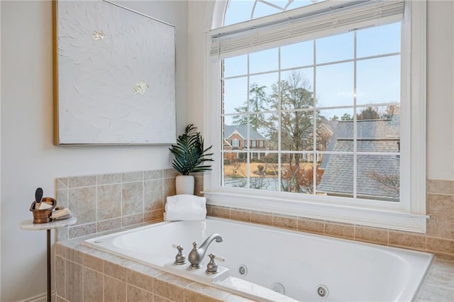 bathroom with a relaxing tiled tub