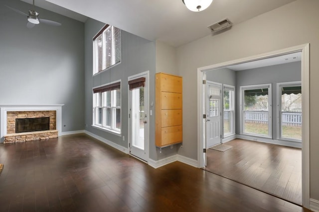 entryway featuring visible vents, plenty of natural light, and hardwood / wood-style floors