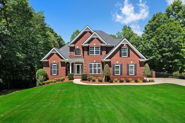 7251 Bluewater Ln, Douglasville, GA 30135 - view of front facade featuring brick siding and a front lawn