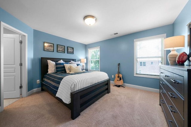 7251 Bluewater Ln, Douglasville, GA 30135 - bedroom with baseboards and light carpet