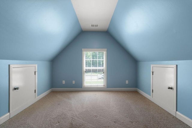 7251 Bluewater Ln, Douglasville, GA 30135 - bonus room with carpet floors, lofted ceiling, and baseboards