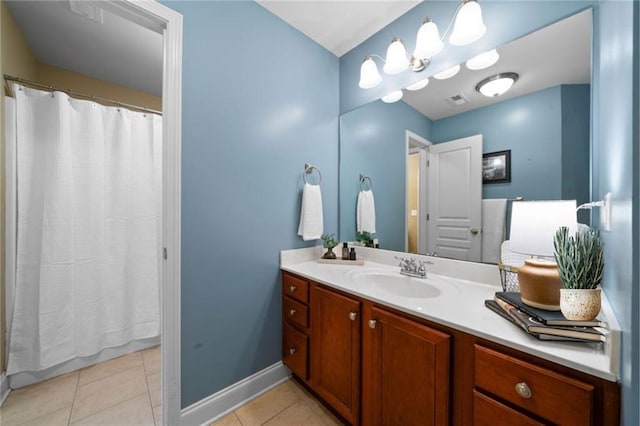 7251 Bluewater Ln, Douglasville, GA 30135 - bathroom with vanity, baseboards, tile patterned floors, and a shower with curtain