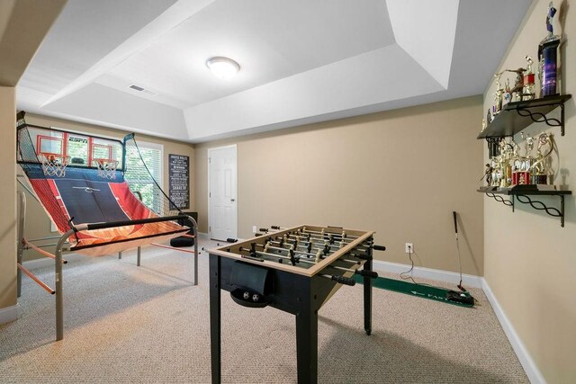 7251 Bluewater Ln, Douglasville, GA 30135 - recreation room featuring a raised ceiling, carpet, and baseboards