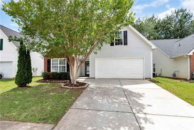 285 Kentshire Pl, Lawrenceville, GA 30044 - view of front facade with driveway and a front lawn