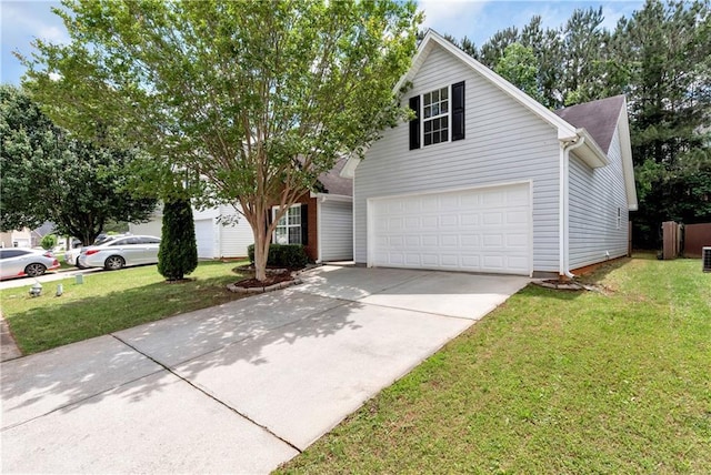 285 Kentshire Pl, Lawrenceville, GA 30044 - view of front facade featuring driveway, a front lawn, and an attached garage