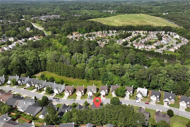 285 Kentshire Pl, Lawrenceville, GA 30044 - aerial view of property's location featuring nearby suburban area and a heavily wooded area
