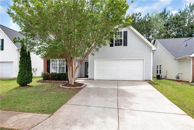 285 Kentshire Pl, Lawrenceville, GA 30044 - view of front of property featuring concrete driveway, a front lawn, and central AC
