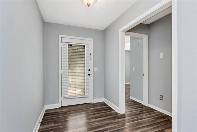 285 Kentshire Pl, Lawrenceville, GA 30044 - doorway to outside featuring dark wood finished floors and baseboards
