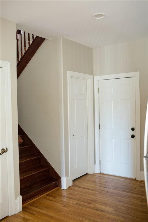 entrance foyer with hardwood / wood-style flooring