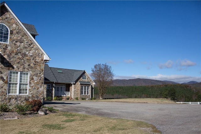 exterior space featuring a mountain view